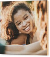Young Woman Smiling While Out With Fitness Group Wood Print