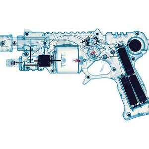 Toy Gun #1 by Science Photo Library