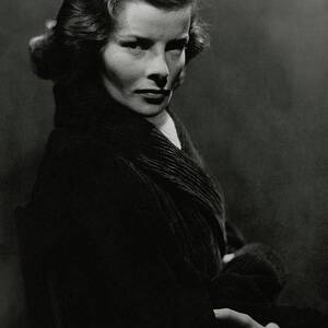 A Portrait Of Katharine Hepburn With Her Arms by Lusha Nelson