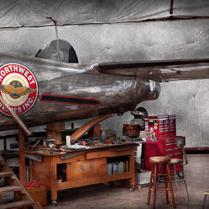 Airplane - The repair hanger  by Mike Savad