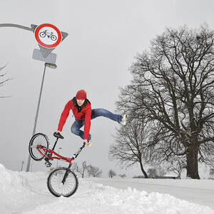 BMX Flatland in the snow - Monika Hinz jumping by Matthias Hauser