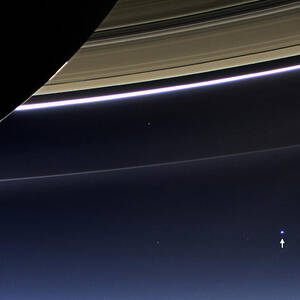 Cassini View Of Saturn And Earth by Science Source