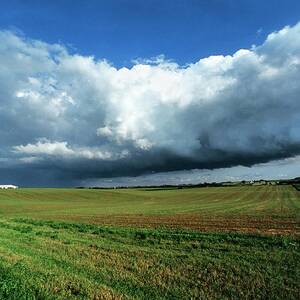 Cold Front Storm Clouds Over Fields by Science Photo Library