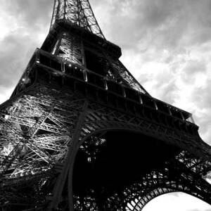 Eiffel Tower in Black and White. Ominous sky overhead by Toby McGuire