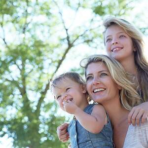 Mother With Her Two Daughters by Science Photo Library