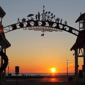 Ocean City Boardwalk Arch New Year Sunrise by Robert Banach