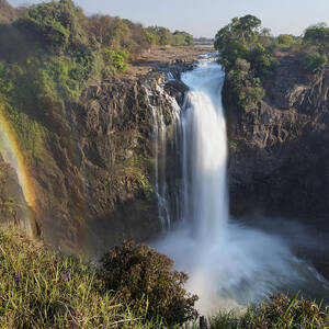 Rainbow In The Mist Of Victoria Falls by Vincent Grafhorst