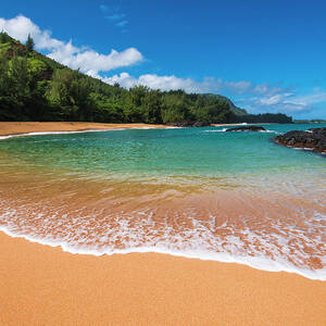 Sand And Surf At Lumahai Beach, Island by Russ Bishop