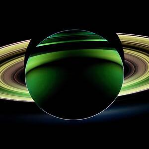 Saturn And Its Rings by Science Photo Library