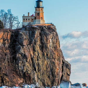 Split Rock Lighthouse In Winter by Paul Freidlund
