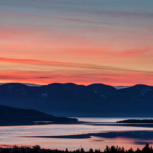 Sunrise Color Over Flathead Lake by Chuck Haney