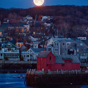 Sunrise moon sets by Jeff Folger