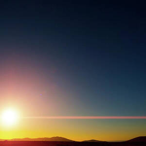 Sunset Against A Clear Sky by Science Photo Library
