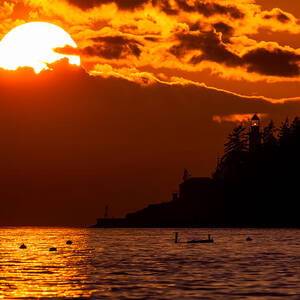 Sunset over Point Atkinson Lighthouse by Alexis Birkill