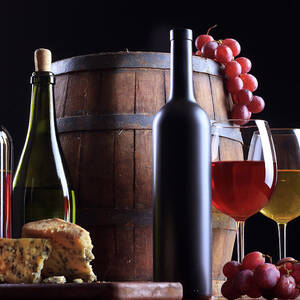 Dramatic Red Wine Splash Into Wine Glass by Donald gruener