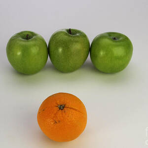 Comparing Apples And Oranges by Photo Researchers, Inc.