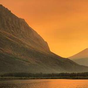 Many Glacier Sunset Beams by Adam Jewell