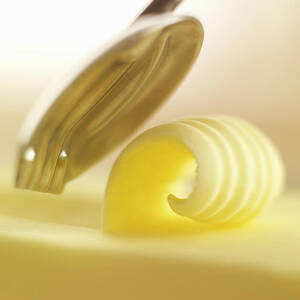 Close Up Of Butter Curl #1 by Adam Gault