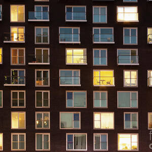 Modern Apartment Block At Dusk #1 by Science Photo Library