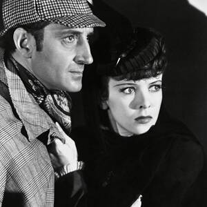 BASIL RATHBONE and IDA LUPINO in THE ADVENTURES OF SHERLOCK HOLMES -1939-. by Album