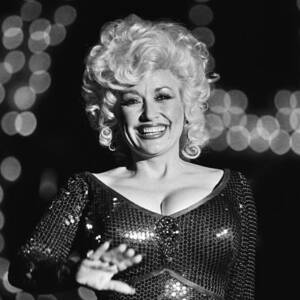 Country Singer Dolly Parton In Concert by George Rose.