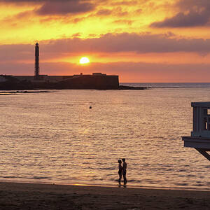 Couple at Sunset in La Caleta Cadiz Spain by Sapiens Verbum