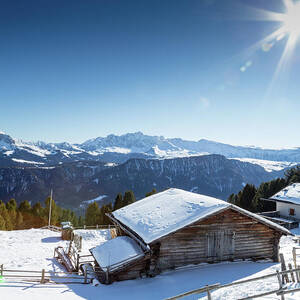 High-altitude mountain hut in front of a panorama of snow-capped by Vivida Photo PC
