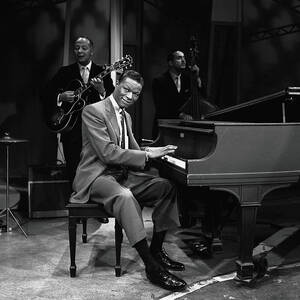 Nat King Cole Performs On Stage by Cbs Photo Archive