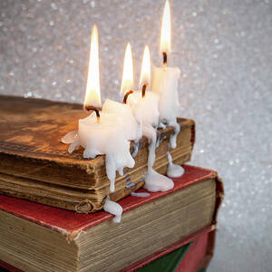 4 Burning Candles With Dripping Wax On Vintage Hard Cover Books #2  Photograph by Dorin Puha - Pixels