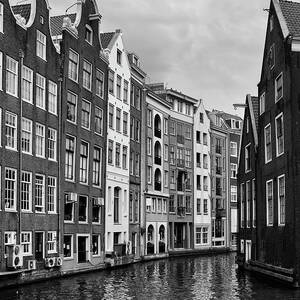 Amsterdam Canal Houses In Black And White by Artur Bogacki