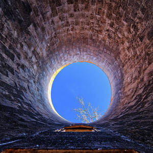 Things are Looking Up - view up through an old silo at abandoned farm site by Peter Herman