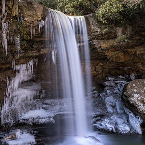 Vertical image of Cucumber Falls in the Ohiopyle State Park in winter by Steven Heap