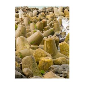 Concrete blocks forming protective coastal seawall Fleece Blanket by  Stephan Pietzko - Pixels