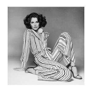 Lois Chiles Wearing A Striped Pajama And Blouse by Francesco Scavullo