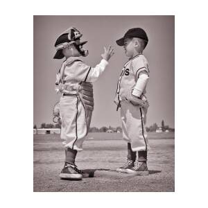 1960s TWO BOYS PITCHER AND CATCHER IN LITTLE LEague baseball