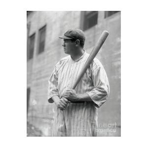 Babe Ruth Holding Baseball Bat by Bettmann
