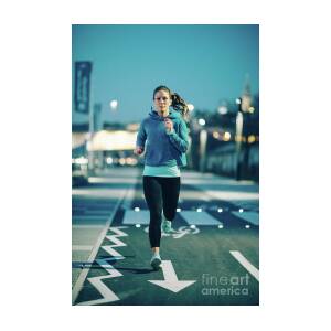 Woman Jogging In City #1 by Microgen Images/science Photo Library
