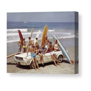 Friends Having Fun On Beach Canvas Print by Tom Kelley Archive