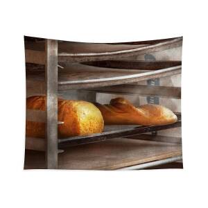 https://render.fineartamerica.com/images/rendered/square-product/small/images/rendered/default/flat/tapestry/images-medium-5/kitchen-food-bread-freshly-baked-bread-mike-savad.jpg?&targetx=-130&targety=0&imagewidth=1191&imageheight=794&modelwidth=930&modelheight=794&backgroundcolor=513729&orientation=1&producttype=tapestry-68-80