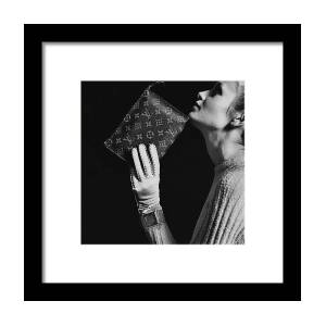 Twiggy Holding Louis Vuitton Envelope Bag Art Print by Bert Stern