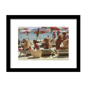 Saint-tropez Beach #1 Framed Print by Slim Aarons Saint-tropez Beach #1 Framed Print by Slim Aarons