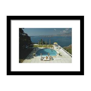 Nirvana Framed Print by Slim Aarons Nirvana Framed Print by Slim Aarons