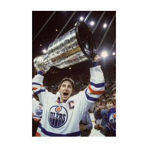 Wayne Gretzky Lifts The Stanley Cup by Bettmann
