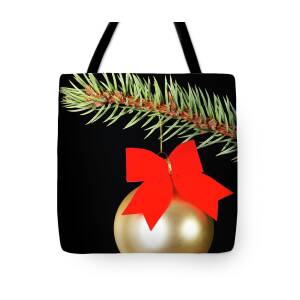 https://render.fineartamerica.com/images/rendered/square-product/small/images/rendered/default/tote-bag/images/artworkimages/medium/1/one-gold-christmas-ball-on-a-green-fir-piotr-marcinski.jpg?&targetx=0&targety=-190&imagewidth=763&imageheight=1143&modelwidth=763&modelheight=763&backgroundcolor=A19E5F&orientation=0&producttype=totebag-18-18