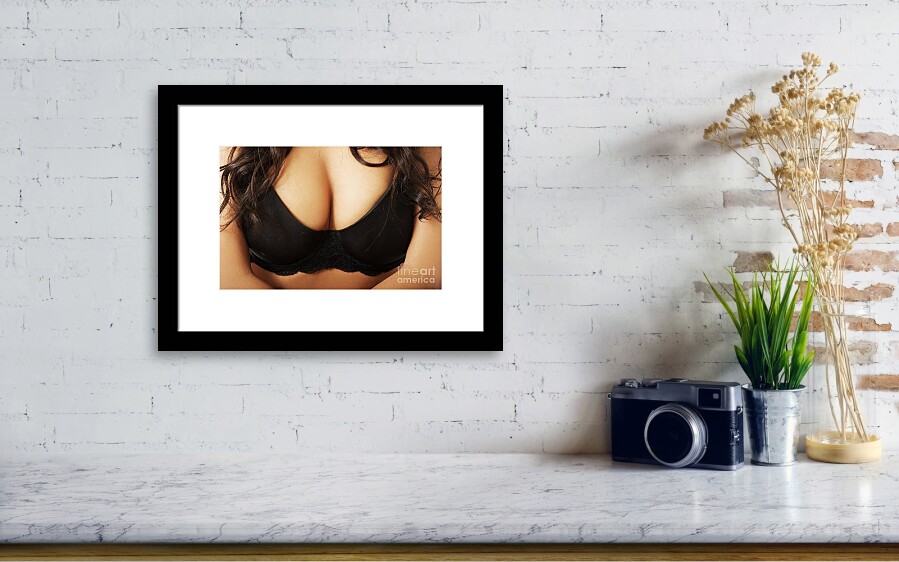 Close up on female boobs in black bra Poster by Piotr Marcinski - Fine Art  America